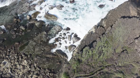 Aerial Cinematic Nature waves, ocean and Rocks Formations Keelung Wangyou Valley Taiwan.