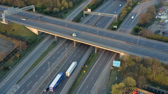 Vehicles Driving on a Freeway at Sunset Using The Junction and Bridges