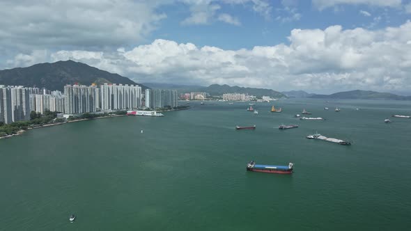 Top view of the sea near Tuen Mun estates in Hong Kong which is surrounded by industries and a beaut