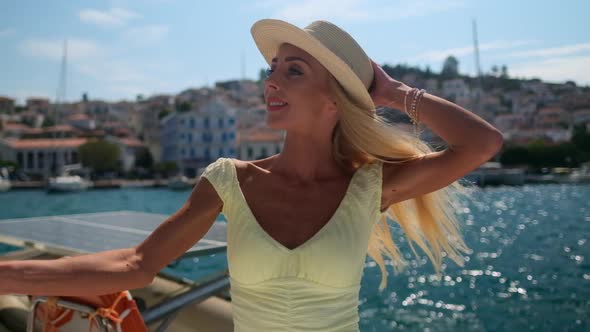 Beautiful Woman on a Yacht Enjoys the Journey Poros Greece Europe