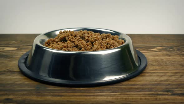 Cat Food In Bowl On Kitchen Floor