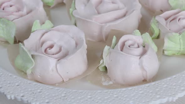 Homemade Marshmallows. Zephyr In The Form Of Flowers With Green Leaves. Spins With A Tray. Close Up