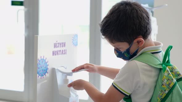 Student Hands Using Sanitizer