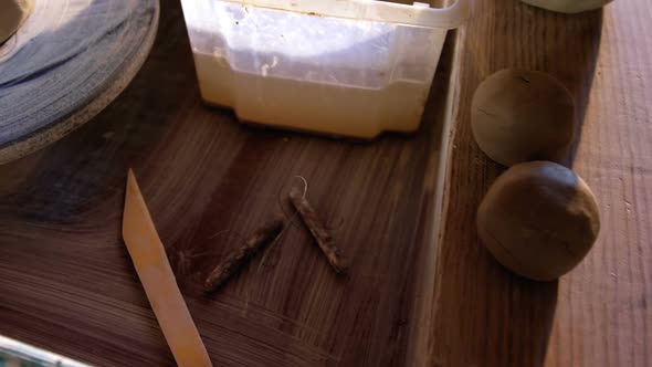 Molded clay on pottery wheel