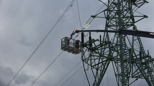 High Voltage Line Workers