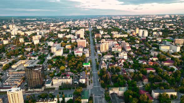 Aerial drone view of Chisinau, Moldova. Buildings, roads, greenery, cloudy sky