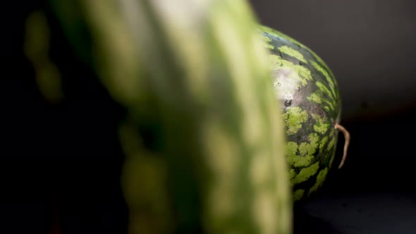 Two Watermelons at Black Background