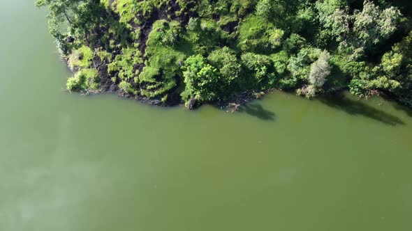 Aerial view of a calm morning atmosphere in an artificial lake or reservoir. Top view