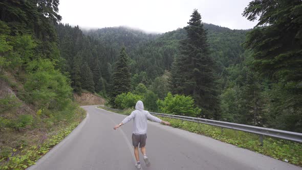 Jogging on the forest road.