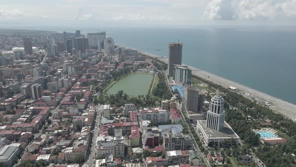 Top aerial view of beautiful lake in the center of Batumi. flying over 6 May park. Georgia