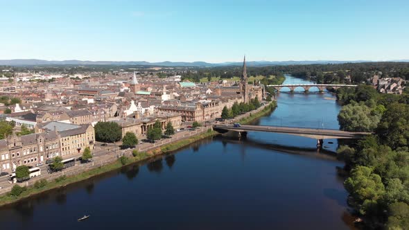 Famous City of Perth and River Tay seen from above on a beautiful summer day. Dolly shot from right