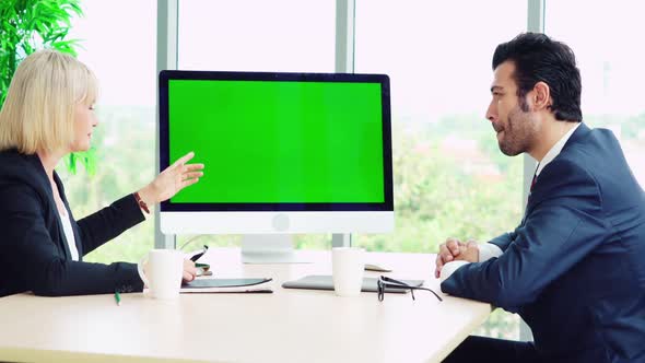 Business People in the Conference Room with Green Screen