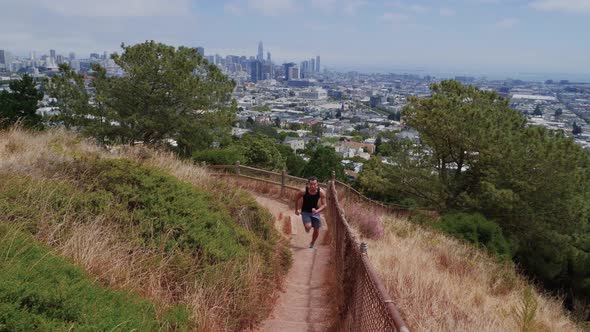 Asian Man Trail Running In San Francisco