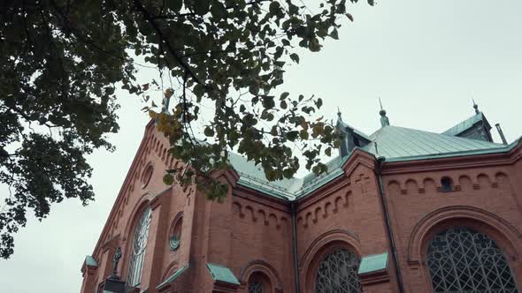 revealing shot of old stone church