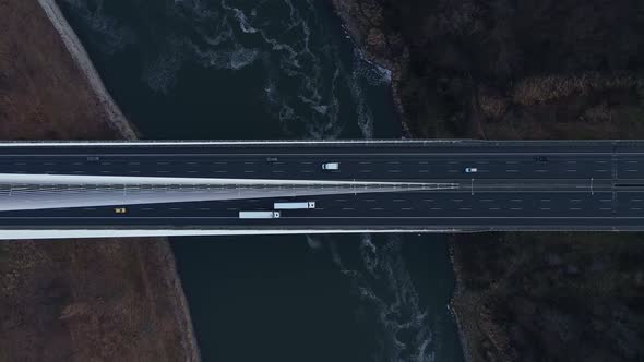 Aerial View of Highway Bridge with Moving Cars