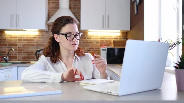 Businesswoman Communicating By Video Call