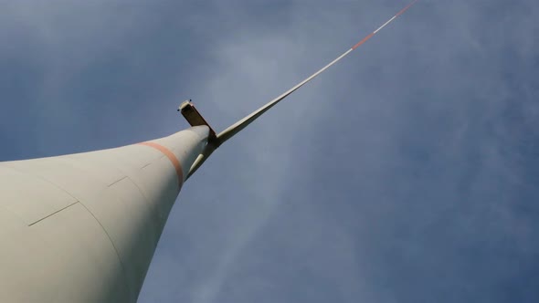 Wind energy.Wind Turbine close-up on sky background.