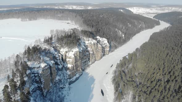 Aerial View of Mountain Cliff and River