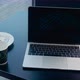 Laptop And Coffee On A Table At A Cafe - VideoHive Item for Sale
