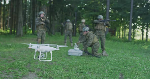 Soldiers Prepare for Deployment of Drone and Preparing for Military Action