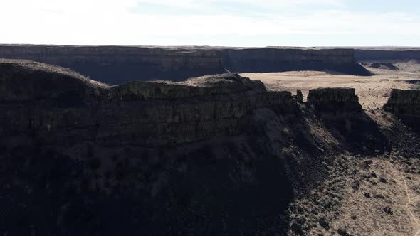 Aerial track of a large canyon butte at Sun Lakes-Dry Falls State Park, Washington
