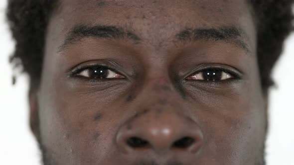 Close Up of Blinking Eyes of African Man