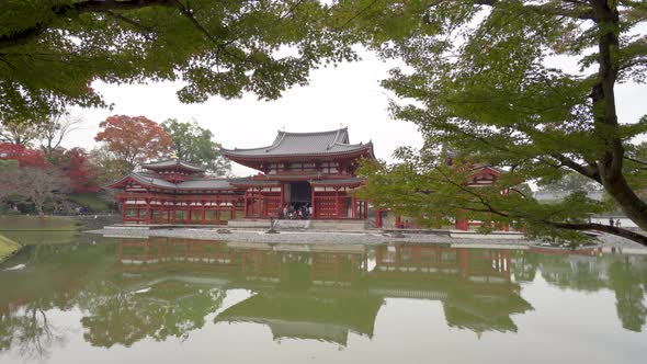 Byodoin temple (Byodo-in) with autumn leaves, Uji City, Kyoto, Japan.