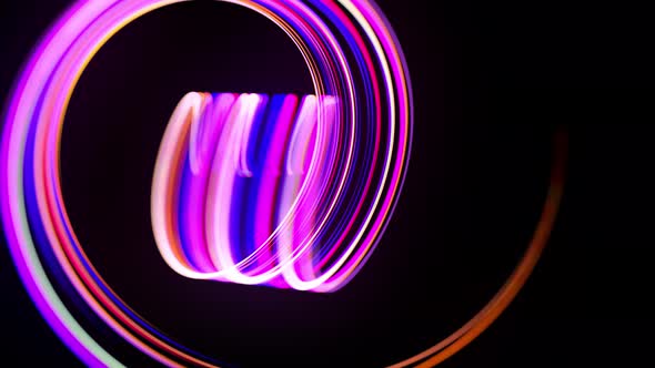 Stream of Multicolor Neon Lines Form Spiral Shape or Curls