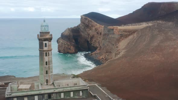 Tourist Exploring Volcano Interpretation Center of Capelinhos on Faial Island