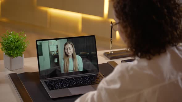 Woman Patient During Online Session with Therapist