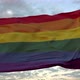 LGBT Pride Flag Waving in the Wind Against Deep Beautiful Sky - VideoHive Item for Sale