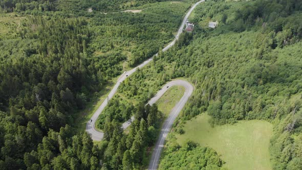 Aerial View of Cars Driving on Country Road