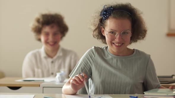 Children in the Class Laugh and Have Fun. Back To School and Happy Childhood Concept. Back To School