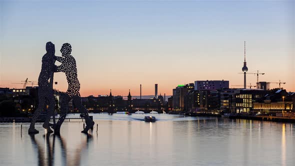 Day to Night Time Lapse of Berlin cityscape with spree river, Berlin, Germany