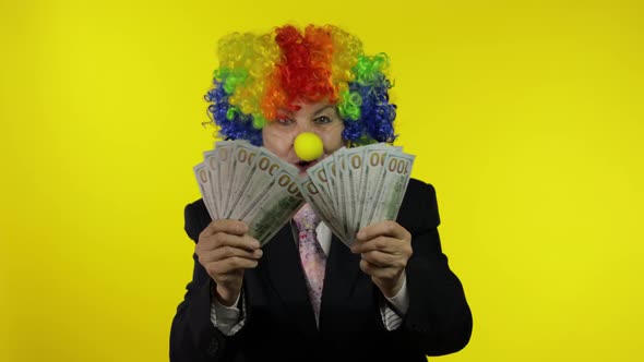 Elderly Clown Businesswoman Freelancer Boss Dancing with Money Cash Banknotes