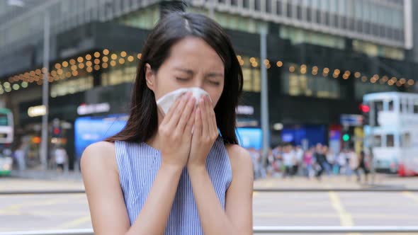 Woman feeling sick at outdoor of Hong Kong