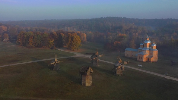 Ukraine. Ukrainian village in autumn. Aerial view. Ukrainian windmill. Foggy morning.