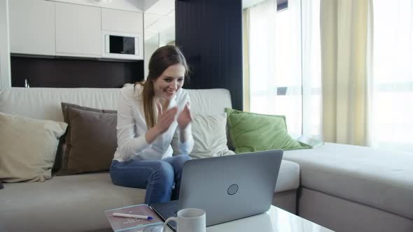 Happy Young Business Woman Enjoy Success Looks At Laptop At Home Office.