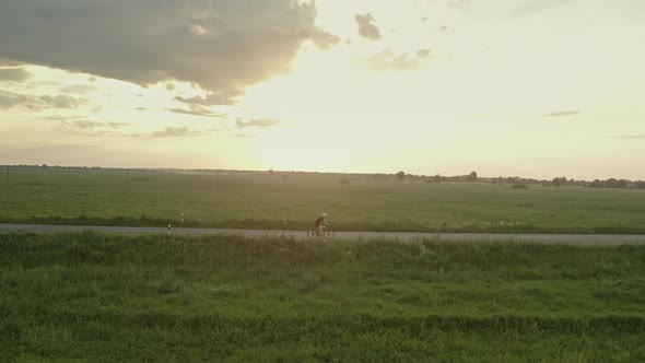 A Sportsman is Riding Fast on the Highway