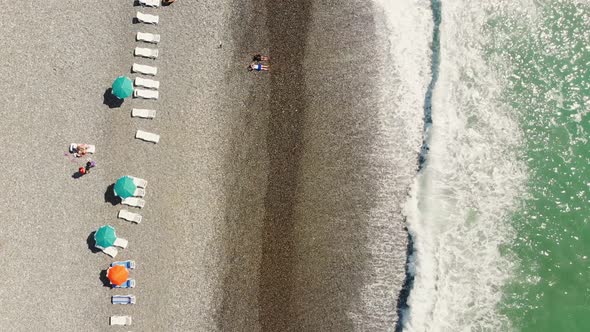 Cinematic View Tourist On The Beach In Batumi