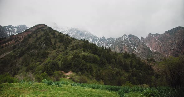 Big Chimgan in clouds. Mountains Chatkal Uzbekistan. Central Asia 1 of 4