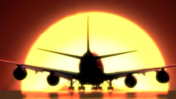 Airplane Lands at Sunset