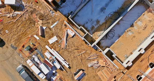 Building Site of Trenches Dug in Ground with Cement As Foundation for Future House