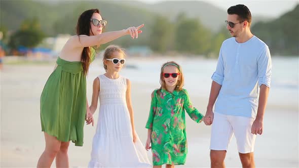 Family of Four on a Tropical Beach