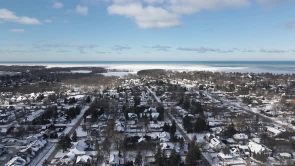 Rising drone shot of Niagara-On-The-Lake, Ontario with a clear sky