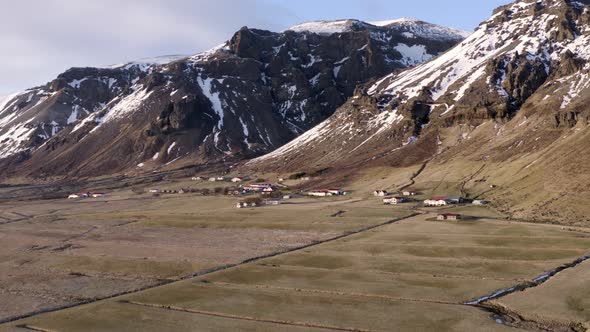 Small Settlement With Mountainous Backdrop in the Winter
