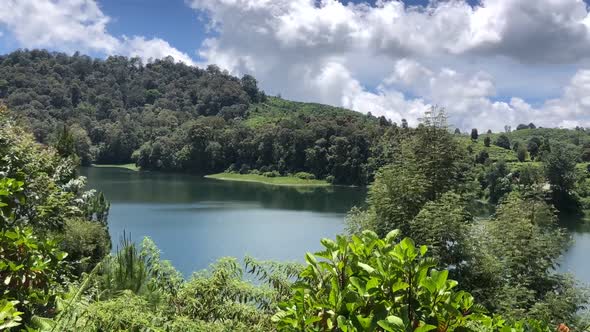 Timelapse of Lake side with park and mountain in Bandung, Indonesia