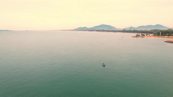 4K aerial view of a drone. Fishermen are sailing in the sea