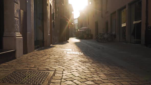 Empty Stone Paved Street in a Small Italian City on Sunny Summer Morning,  Slow Motion. Idyllic Riva