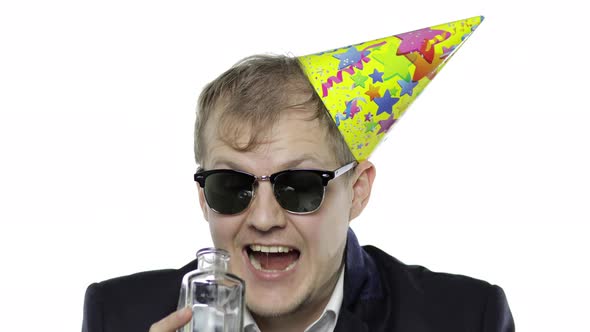 Drunk Businessman in Festive Cap, Sunglasses Drink Alcohol, Showing OK Sign